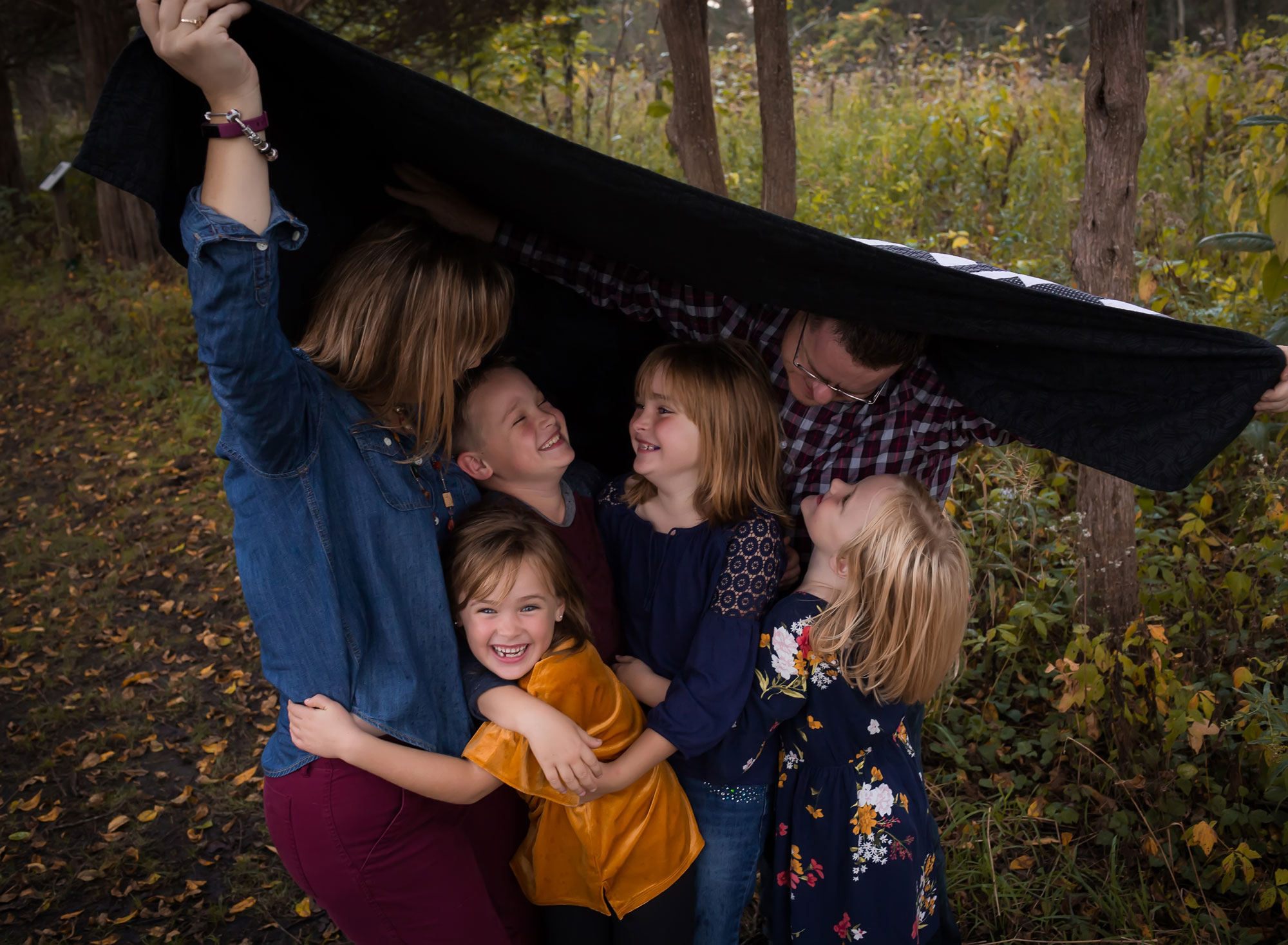 family-photo-under-blanket