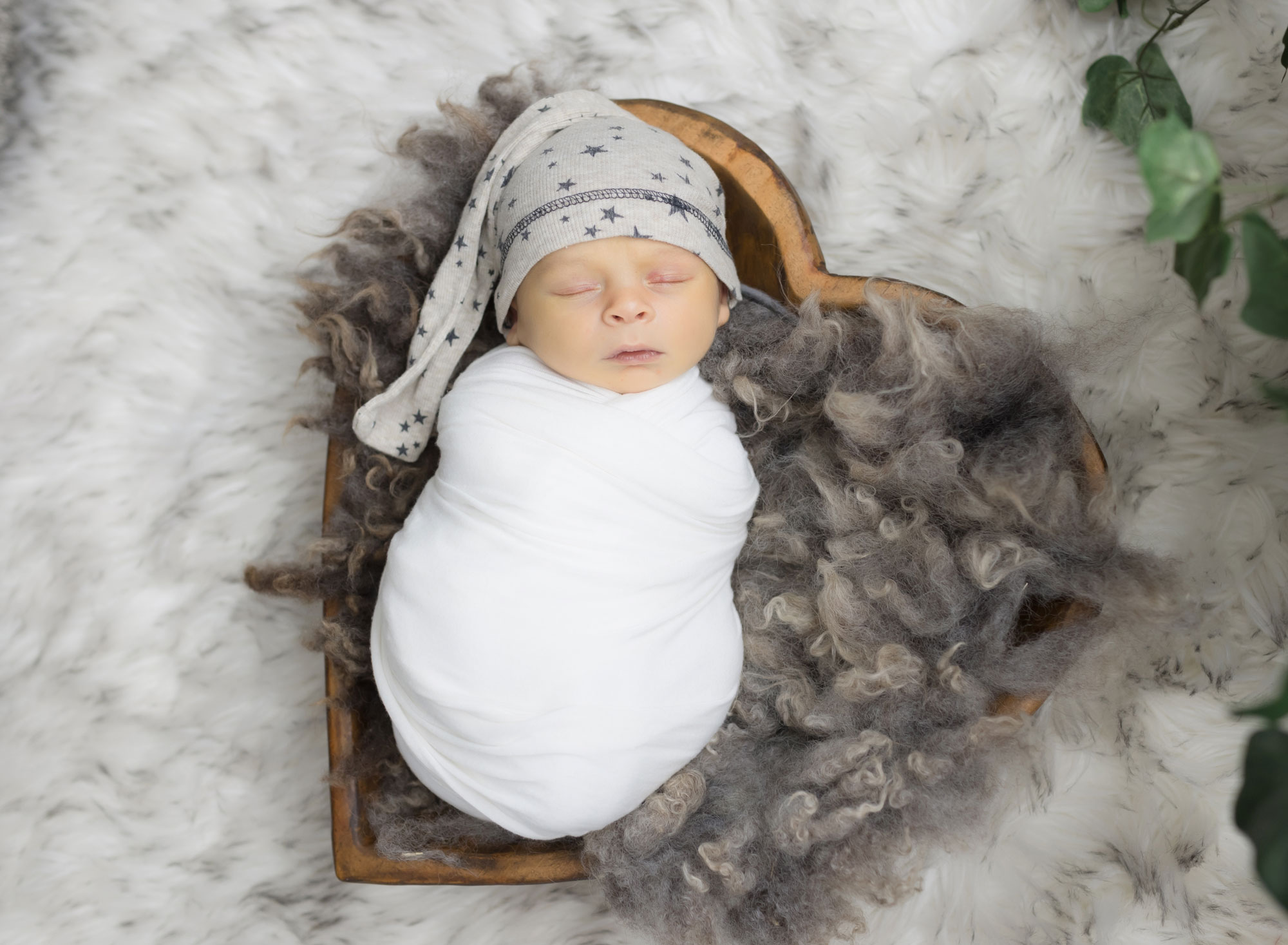 newborn baby with star hat